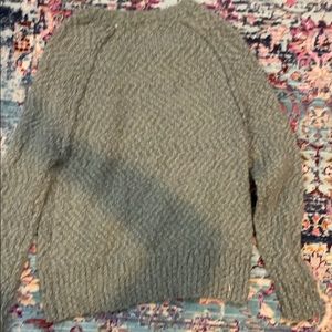 a sweater/ long sleeve shirt